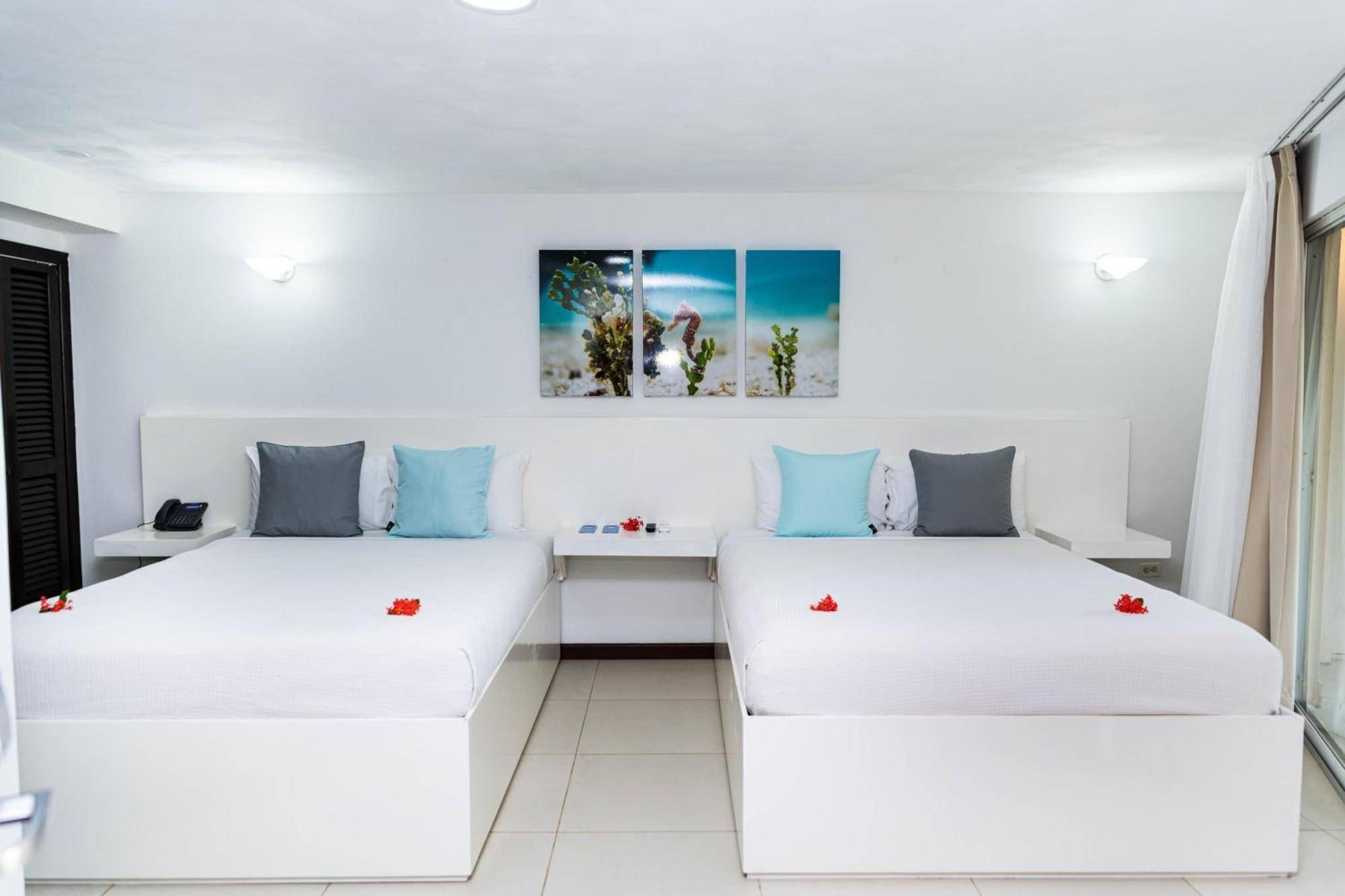 Paradise Beach Hotel & Resort West Bay Pokoj fotografie